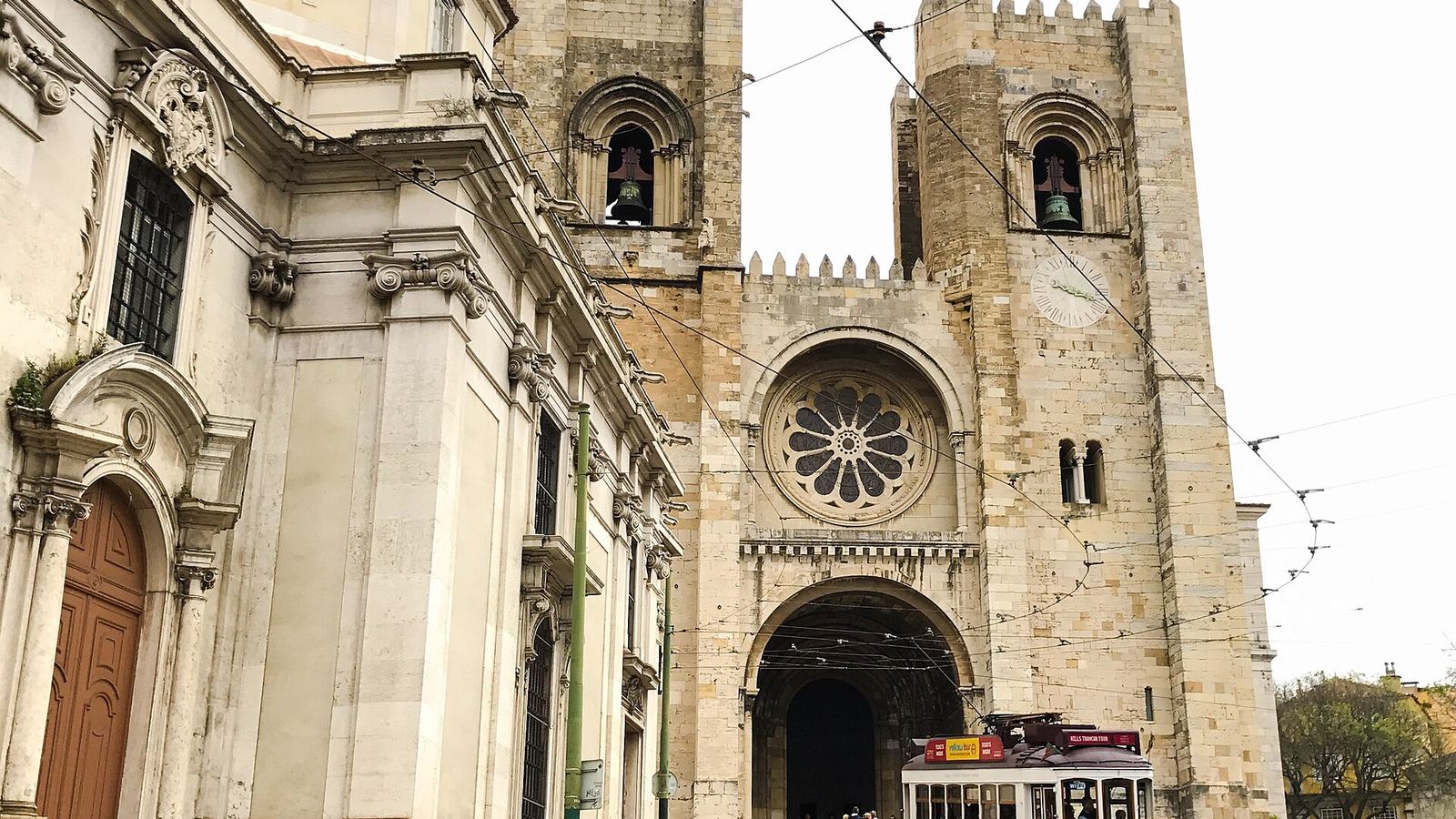 Tram 28 passing in front of Lisbon Cathedral