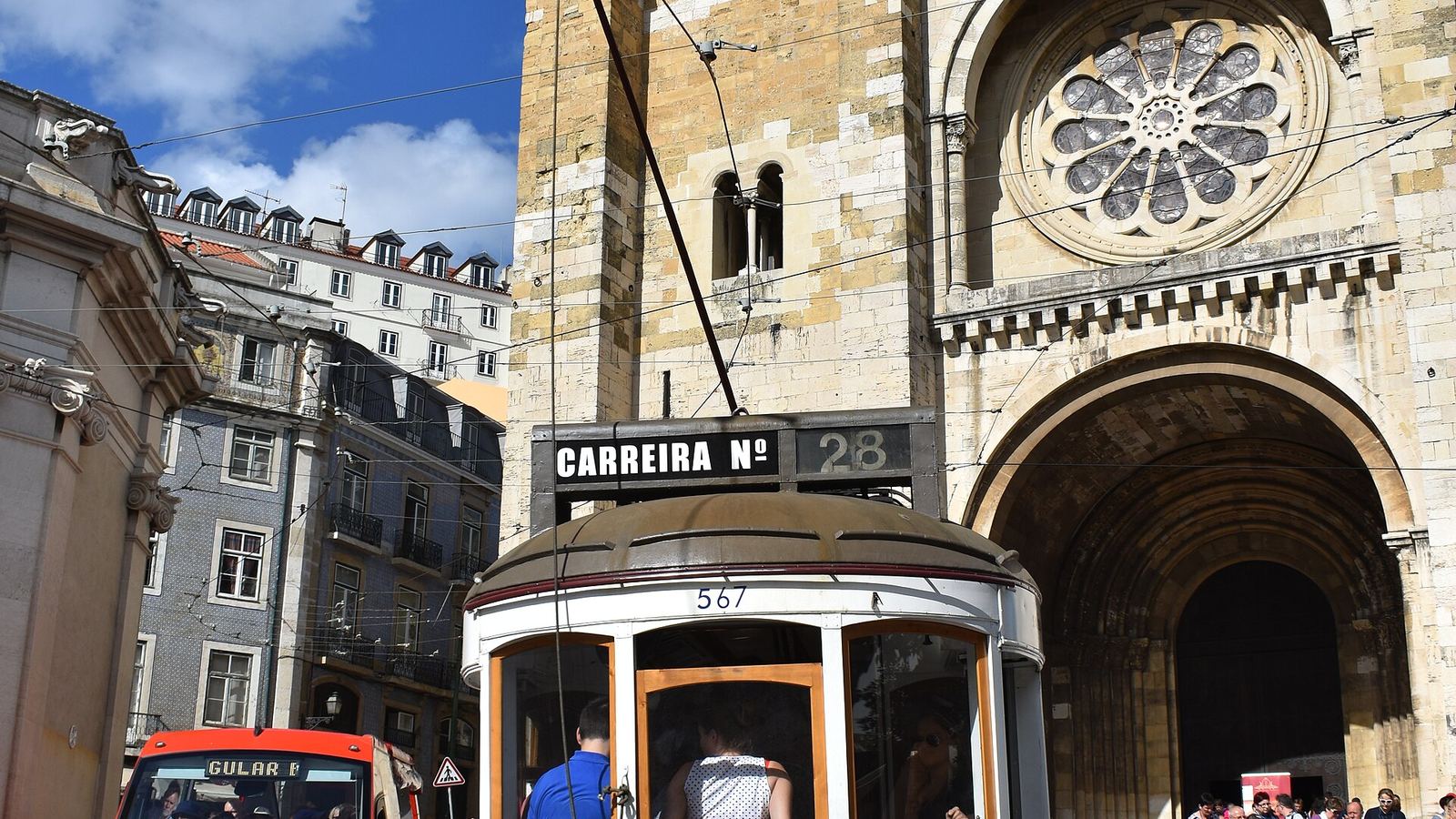 Tram 28 passing Lisbon Cathedral